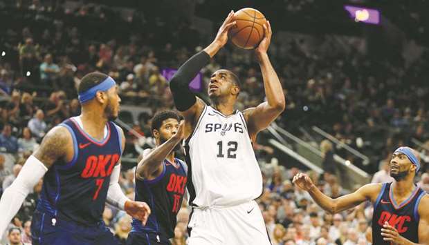 San Antonio Spurs power forward LaMarcus Aldridge shoots the ball as Oklahoma City Thunder power forward Carmelo Anthony defends during the first-half of their NBA game. PICTURE: USA TODAY Sports