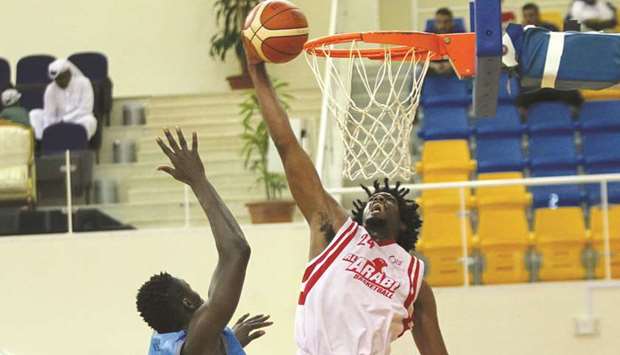 Al Wakrah and Al Arabi players in action during their Emiru2019s Cup basketball tournament at the Al Gharafa Sports Club yesterday.