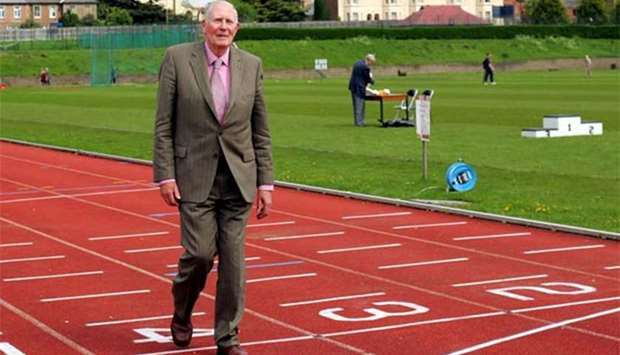Sir Roger Bannister walks over the same finish line at the Iffley Road running track in Oxford that he crossed in 1954 in this file picture.