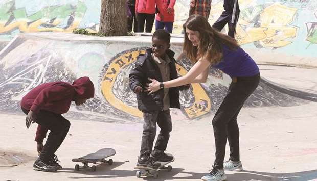Refugee children skate at the u201c7Hills Skate Parku201d in Amman, that was constructed in 2014 by passionate skateboarding volunteers from all over the world thanks to an initiative launched by a German NGO and a local Jordanian association.