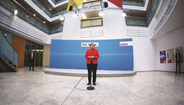 Merkel giving a statement at the Christian Democratic Union (CDU) headquarters in Berlin.