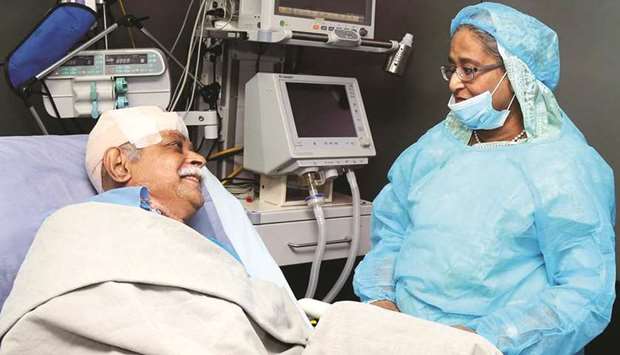 Prime Minister Sheikh Hasina visits Zafar Iqbal at the Combined Military Hospital in Dhaka yesterday.