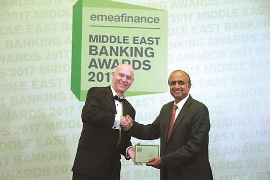 Doha Bank UAE country head Alaga Raja receiving the award.