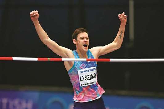 In this March 1, 2018, picture, Authorised Neutral Athlete Danil Lysenko celebrates his menu2019s high jump final win at the IAAF World Indoor Championships in Birmingham. (AFP)