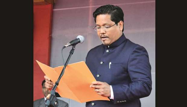Conrad Sangma takes oath as the 12th chief minister of Meghalaya in Shillong yesterday.