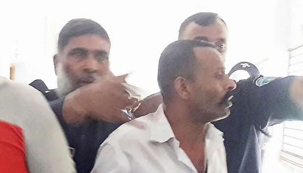 Rosu Khan appearing in court in Chandpur district in Chittagong Division yesterday.