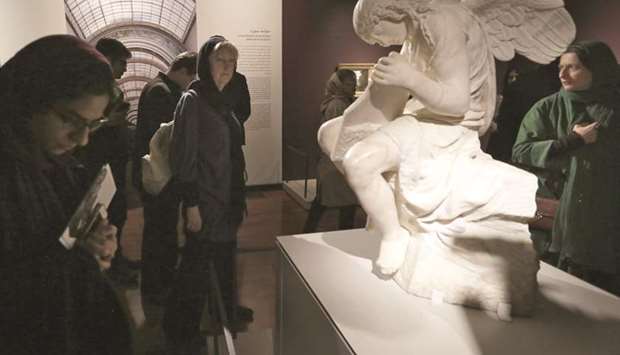 Iranians visit an exhibition of 50 artworks from French museum the Louvre,  at the National Museum in central Tehran.