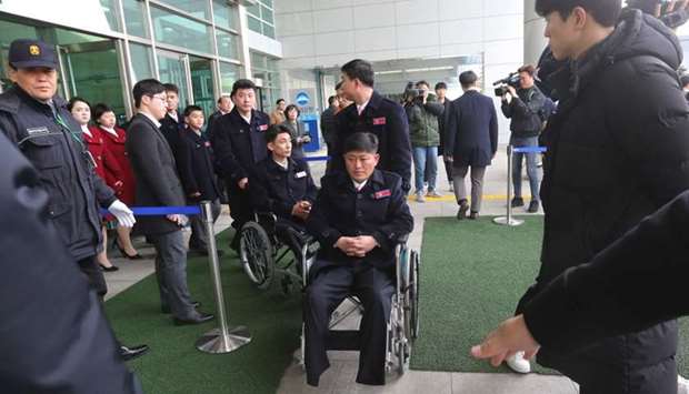 North Korean athletes arrive to participate in the 2018 Pyeongchang Paralympic Games at the Korean-transit office near the Demilitarized Zone in Paju.