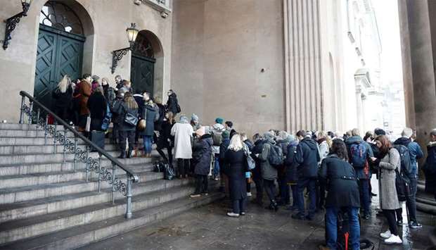 The press and hearers line up in front of the courthouse where the trial of Danish inventor Peter Madsen, charged with murdering and dismembering Swedish journalist Kim Wall aboard his homemade submarine