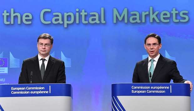 European Commission Vice-Presidents Valdis Dombrovskis (L) and Jyrki Katainen