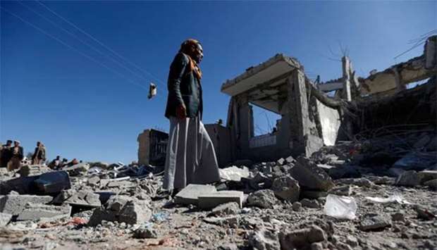 Yemenis check the damage in the aftermath of a reported air strike by the Saudi-led coalition in Sanaa on Thursday.
