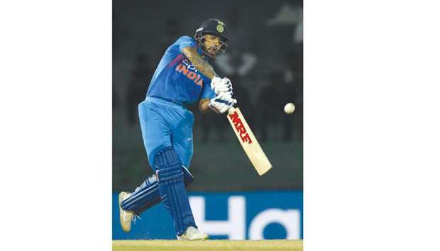 Indian batsman Shikhar Dhawan plays a shot during the Nidahas Trophy tri-nation Twenty20 match against Bangladesh at the R Premadasa Stadium in Colombo yesterday. (AFP)