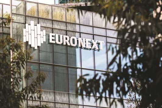 The Euronext logo is seen on the exterior of the Paris Stock Exchange. The CAC 40 climbed 1.3% to close at 5,254.10 points yesterday.