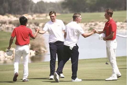 Asia-Pacific men (in red T-shirt) with Europe players during the first day play of the Bonallack Trophy yesterday.