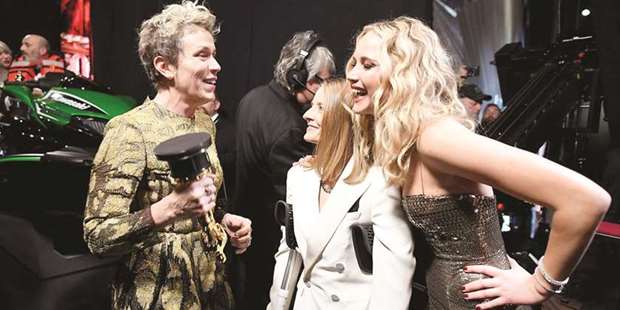 CHITCHAT: Best Actress Frances McDormand, left, enjoys a laugh with past Oscar winners Jodie Foster, centre, and Jennifer Lawrence backstage.