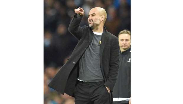 Manchester Cityu2019s Spanish manager Pep Guardiola gestures on the touchline on Wednesday.