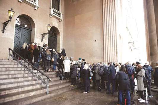 Members of the press and the public line up in front of the Copenhagen courthouse where the trial of Danish inventor Peter Madsen was taking place.