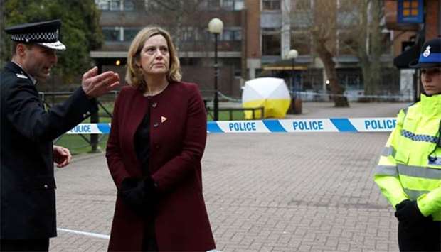Britain's Home Secretary Amber Rudd visits the scene where Sergei Skripal and his daughter Yulia were found after having been poisoned by a nerve agent in Salisbury on Friday.