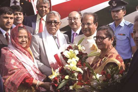 Jagdish Mukhi, the governor of Indian state of Assam, greets Bangladesh President Abdul Hamid on his arrival at Lokapriya Gopinath Bordoloi International (LGBI) airport in Guwahati yesterday.