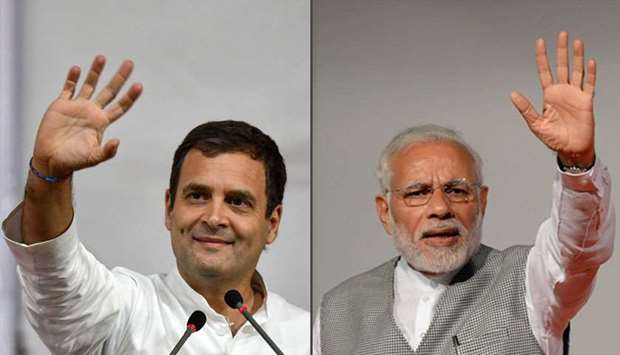 The election will see Prime Minister Narendra Modi (R) run for a second term against Rahul Gandhi (L), the latest scion of the Gandhi-Nehru dynasty