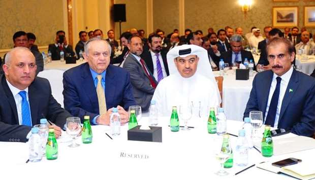 HE al-Kuwari (centre) joins Dawood, as well as Pakistan's Board of Investment chairman Haroon Sharif and Pakistan ambassador Syed Ahsan Raza Shah during the Qatar-Pakistan Trade and Investment Conference held in Doha on Sunday. PICTURE: Ram Chand
