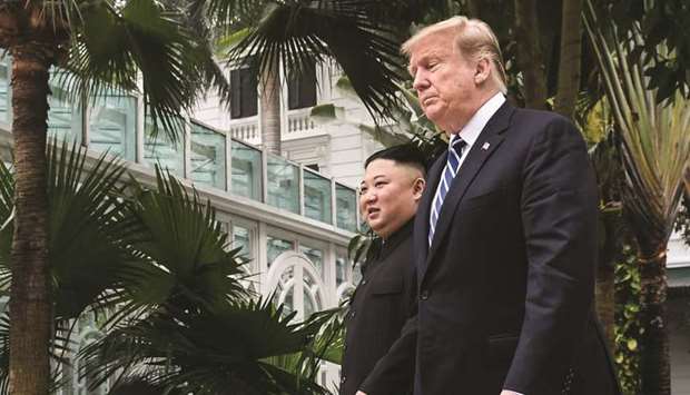 US President Donald Trump (right) walks with North Koreau2019s leader Kim Jong-un during a break in talks at the second US-North Korea summit at the Sofitel Legend Metropole hotel in Hanoi.
