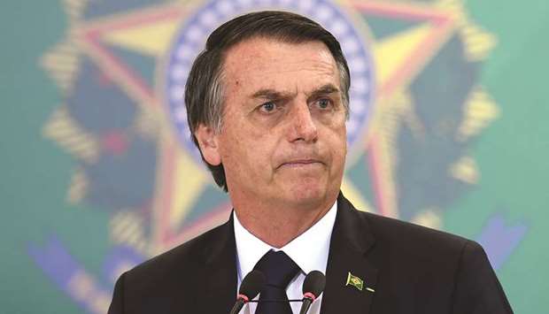 Brazilian President Jair Bolsonaro delivers a speech during the appointment ceremony of the new heads of public banks, at Planalto Palace in Brasilia (file). As the initial stock market euphoria over Bolsonarou2019s election victory subsides, investors are clamouring for signs of concrete progress.