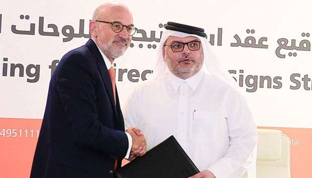Ashghal president Dr Eng. Saad bin Ahmad al-Muhannadi and Parsons International president Garold Adams after signing the contract