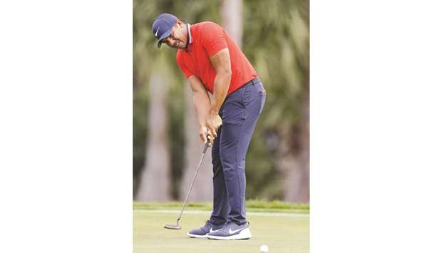 Jhonattan Vegas of Venezuela putts on the third green during the first round of the Honda Classic at PGA National Resort and Spa in Palm Beach Gardens, Florida. (AFP)