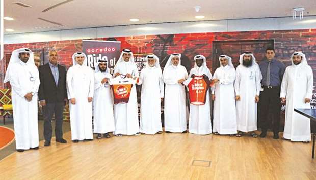 Officials attend the ceremony announcing the partnership.