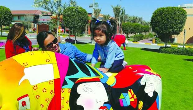 Chaine Dimaano takes her daughter Kaliya at a play area at Baladna Park.