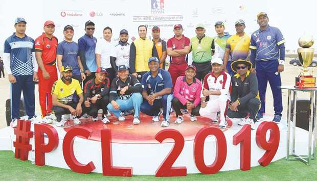 Captains of all the teams participating in the tournament pose with the PCL 2019 Trophy.