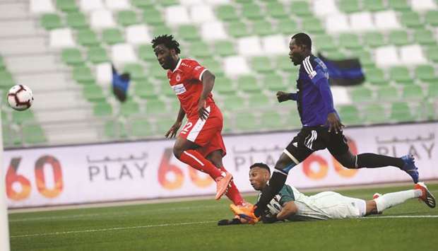 Al Arabiu2019s Wilfried Bony (left) scores in the QNB Stars League match against Al Sailiya yesterday. PICTURE: Shemeer Rasheed