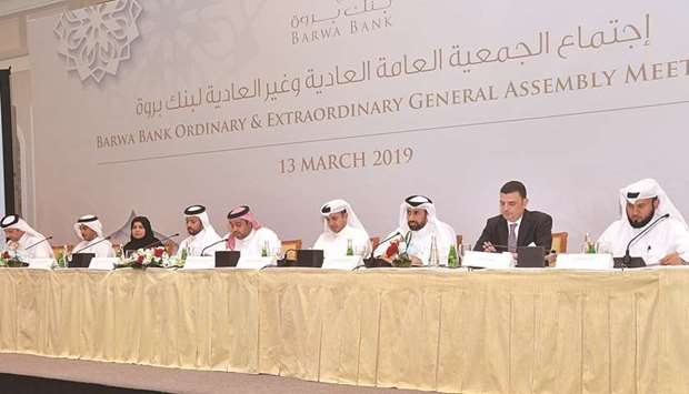 Sheikh Mohamed and other Barwa Bank Group directors at the companyu2019s annual general meeting and extraordinary general meeting at the Four Seasons yesterday. PICTURE: Noushad Thekkayil