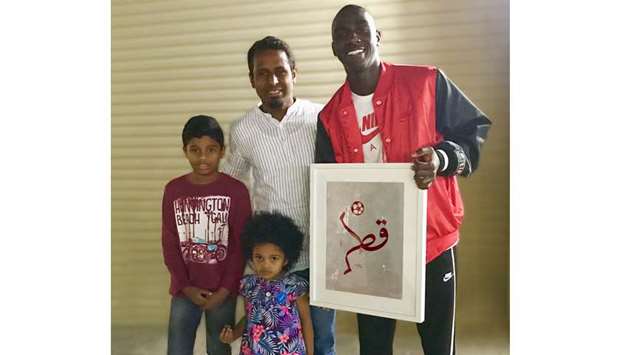 GROUP: Almoeez Ali, football player, right, along with Abdul Kareem, centre, and his family.