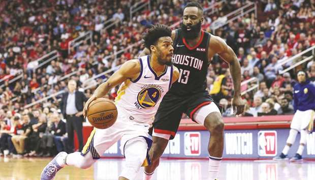 Golden State Warriors guard Quinn Cook drives to the basket as Houston Rockets guard James Harden defends during the second quarter at Toyota Center. PICTURE: USA TODAY Sports