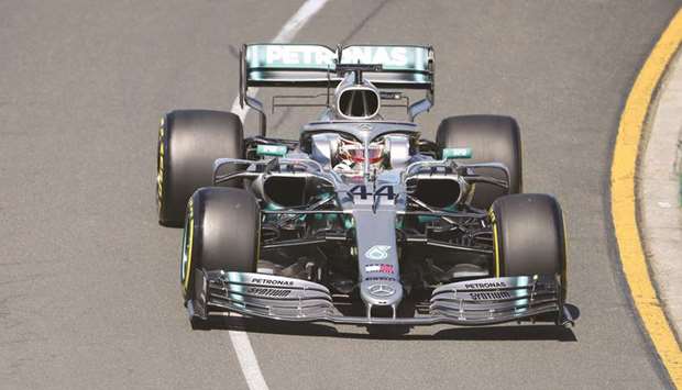 Mercedesu2019 British driver Lewis Hamilton speeds through a corner during the first Formula One practice session in Melbourne yesterday.