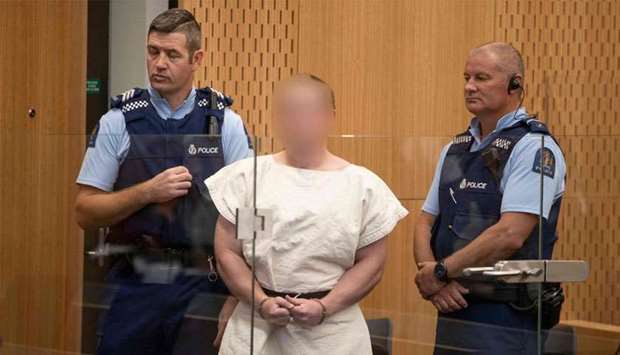 Brenton Tarrant, the man charged in relation to the Christchurch massacre appear in the dock charged with murder in the Christchurch District Court