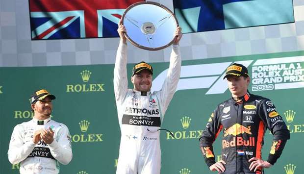 Mercedes' Valtteri Bottas holds the winners trophy after winning the Formula One F1 Australian Grand Prix at the Albert Park Grand Prix Circuit in Melbourne