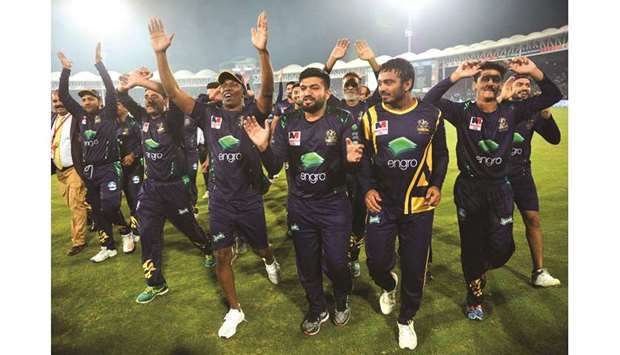 Quetta Gladiators players celebrate after winning the Pakistan Super League at the National Stadium in Karachi yesterday. (AFP)