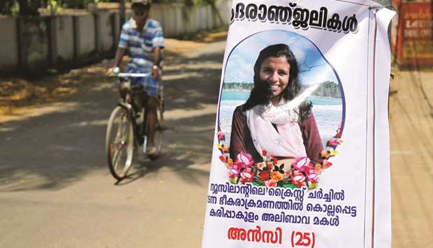 A poster of Ansi Karippakulam Alibava, who was killed in Fridayu2019s mosque attacks in New Zealand, is put up in Kodungalloor town in Kerala yesterday. The words on the poster read: u201cCondolence to Ansi, 25, daughter of Karipakulam Alibava killed in a terrorist attack in Christchurch, New Zealandu201d.