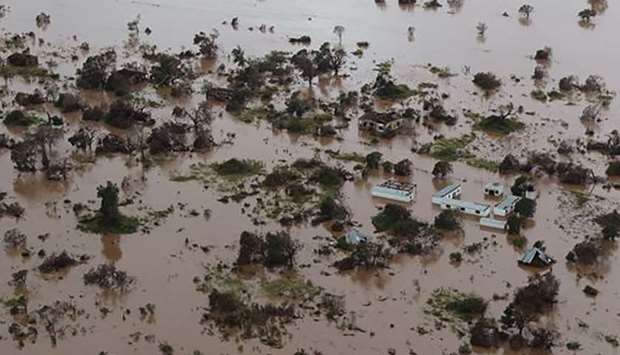 Houses and flooding in an area affected by Cyclone Idai in Beira. AFP / Mission Aviation Fellowship /Rick Emenaket