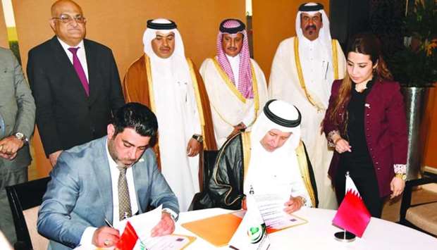 HE al-Kuwari witnessing the signing of a Memorandum of Understanding (MoU) between Qatar Polymer Industrial Company and Al Qawas Real Estate Investments Company.