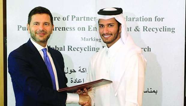 Italian ambassador Pasquale Salzano and EPR chairman Abdalla al-Suwaidi at the agreement signing, marking the 2019 Global Recycling Day in Doha. PICTURE: Shemeer Rasheed.