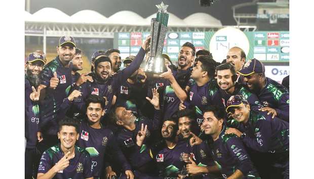 Quetta Gladiators players celebrate after winning the Pakistan Super League at the National Stadium in Karachi on Sunday. (AFP)