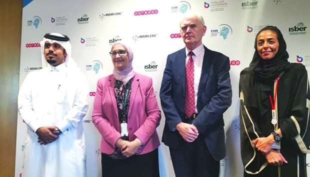 QF, Qatar Biobank, and Ooredoo officials at the event.