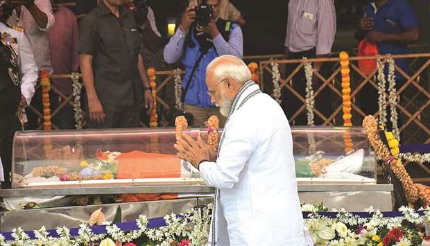 Prime Minister Narendra Modi pays his respects to Manohar Parrikar during his funeral in Panaji yesterday.