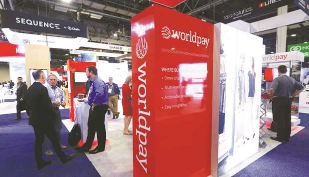 A Worldpay booth is shown on the exhibit hall floor during the Money 20/20 conference in Las Vegas, Nevada (file). Fidelity National Information Services agreed to buy Worldpay for about $35bn yesterday, with the US financial services provider striking the biggest deal to date in the fast-growing electronic payments industry.