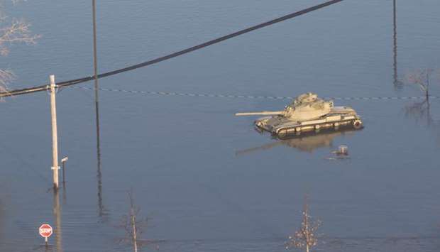 A tank is stranded at the flooded Camp Ashland, the Army National Guard facility, in Ashland, Nebraska.