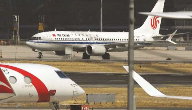 An Air China Boeing 737 MAX 8 plane is seen at Beijing Capital Airport. The key role China played in grounding the troubled 737 MAX 8 has demonstrated its growing clout in global aviation and may give it an extra bargaining chip in trade talks with the US.